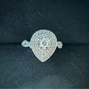 White gold diamond ring. Listed price OBO. Will most likely need resized.